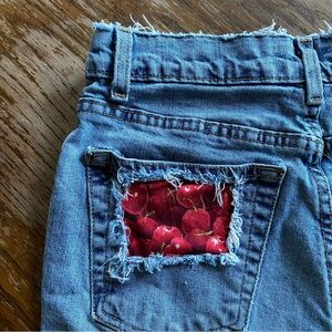 Vintage Old Navy light Blue jean cut off Shorts with Red Cherry Patch on pocket